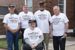 Five Veterans in reunion t-shirts