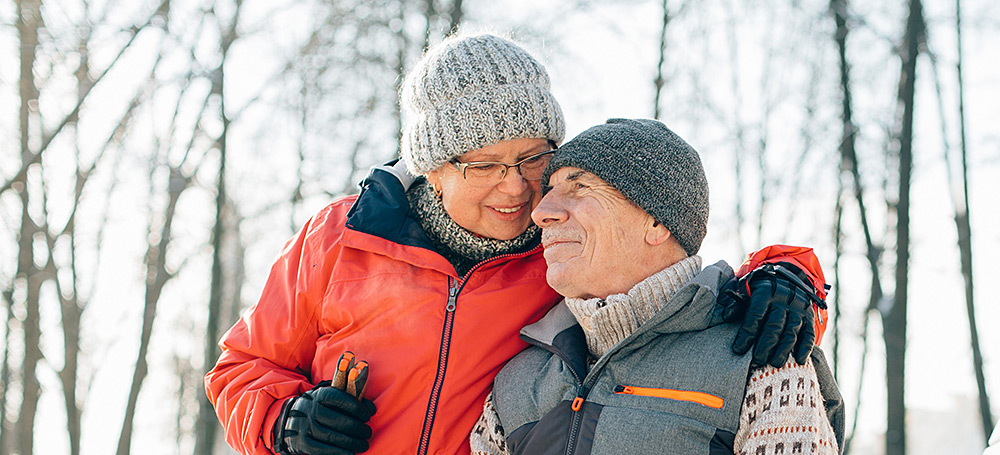 Elderly couple at a park in winter