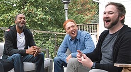three men laughing
