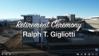 Building with the words "Retirement Ceremony - Ralph T. Gigliotti"
