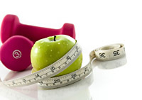 weight with apple and measuring tape