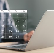 calendar floating over laptop