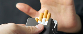 Quit Smoking, hand up to offer of cigarettes.
