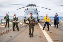 Five women Veterans on aircraft carrier