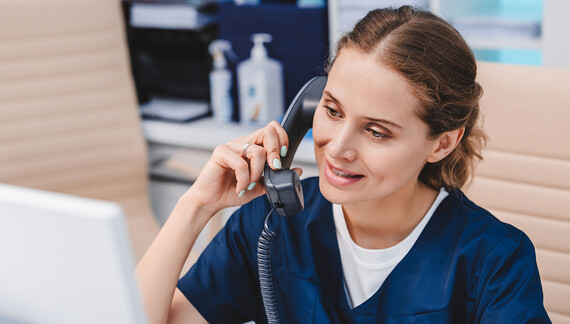 Female medical staff talking on phone.