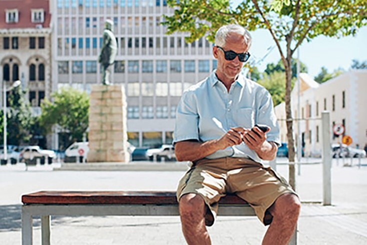 Eye care patient sitting on a bench