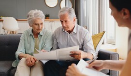 Senior couple reviews healthcare decisions