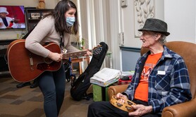 Music therapy specialist and senior Veteran