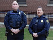male and female VA Police standing with body cams