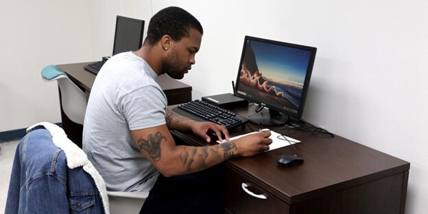 Air Force Veteran Oscar Benn works in the on-site computer lab at the West LA VA Domiciliary (DOM) 