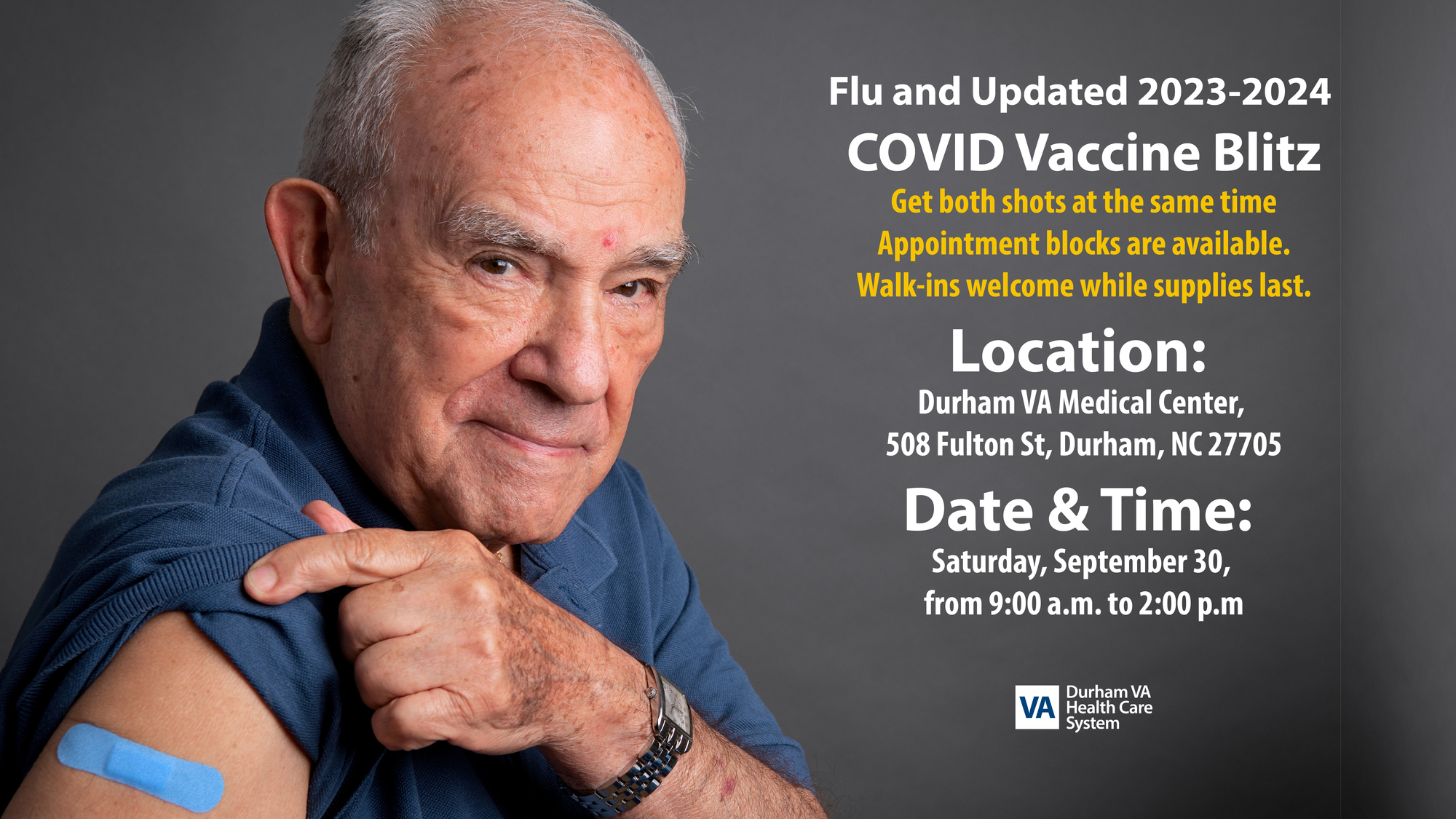 A man with his right sleeve pulled up showing a band-aid where he received a shot. 