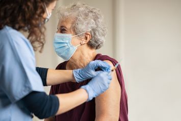 A Veteran receiving a routine vaccination at the VA