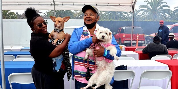Army Veteran Pamela Richardson (right) and daughter Traci Richardson (left) attended the 2023 GLA Stand Down event to access pet services. 