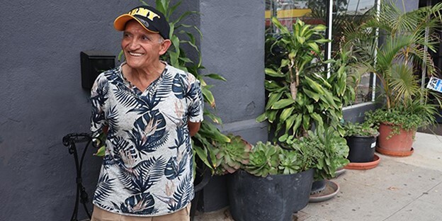 Army Veteran Jimmy Villanueva smiles as he talks about his experience with the Homeless Veterans Dental Program 