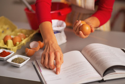 Closeup on woman preparing christmas dinner in kitchen