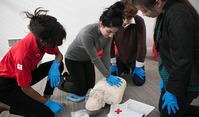People practicing CPR   
