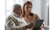 Veteran and caregiver reviewing information with Video Connect