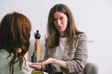 Therapist explaining information to patient