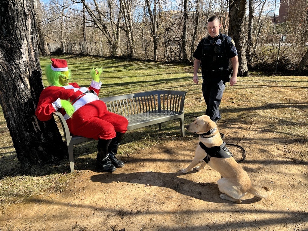 K9 Officer Snitch, Grinch played by Elizabeth Troutman, Education and Staff Development Registered Nurse, and Sergeant Gillenwater.