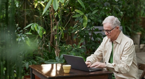 Senior on his computer