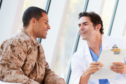Veteran meeting with a doctor image.