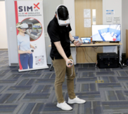 SimX Vendor demonstrates VR technology 