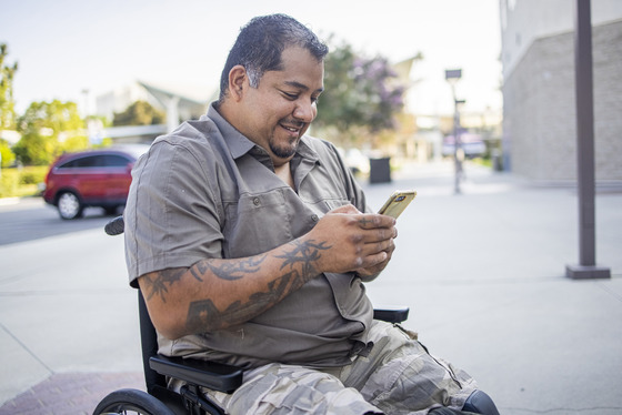 Veteran using smartphone