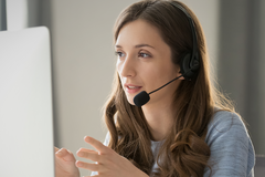 Customer service woman chatting on a phone call.