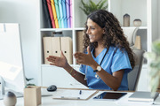 Woman Doctor Using Computer