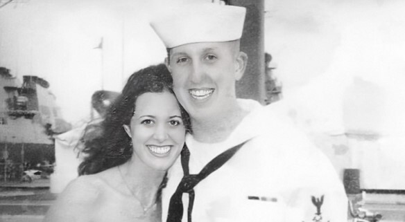 Black and white photo of Ron Haskell, U.S. Navy Veteran, next to his wife at the Norfolk Naval Base.