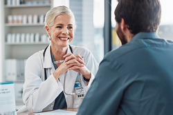 Doctor consulting with patient.