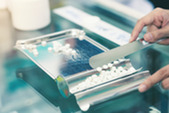 Stock photo of a pharmacy dispensing medication