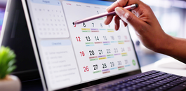 Organizing Calendar Appointments and Meetings on Laptop image.