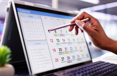 Organizing Calendar Appointments and Meetings on Laptop image.