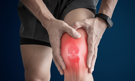 Man touching arthritis knee at pain point.