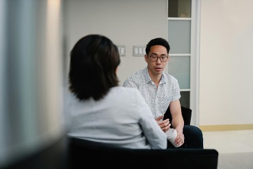 Patient sitting with therapist