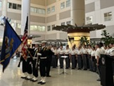 group standing with flags 