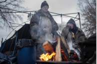 people outside around fire