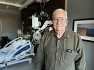 man smiling thanking team