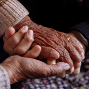 Close up of clasping hands
