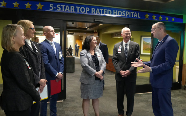 group of people standing in entryway
