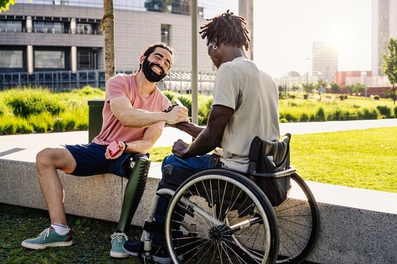 Friends greet each other at a park