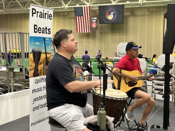 people sitting a smiling at event