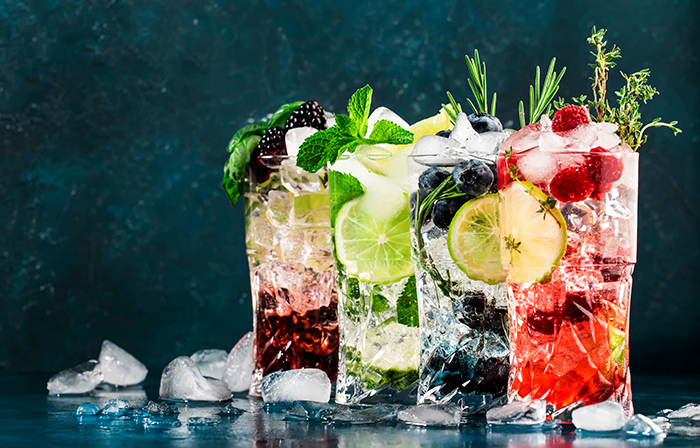A row of colorful mocktails.