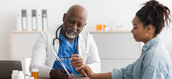 Doctor talking with patient.