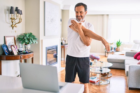 Veteran exercising at home Tele Pain