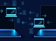 two laptops exchanging information.