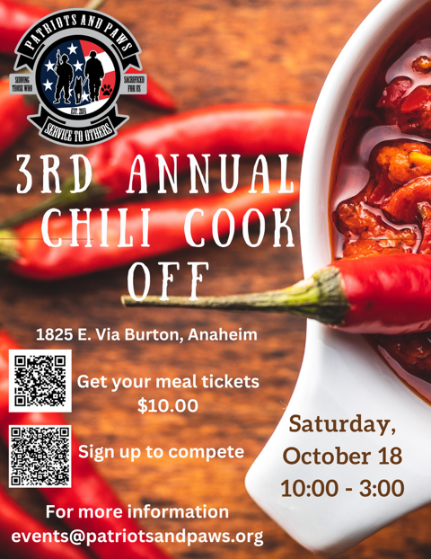 Bowl of chili with red chilis in the background