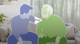 two people sitting on a park bench talking