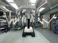 a large white and black robotic surgery machine 